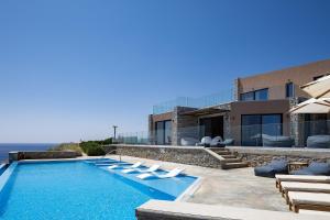 The swimming pool at or close to Seafront elegant villas, with infinity pools & devine views!
