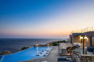 The swimming pool at or close to Seafront elegant villas, with infinity pools & devine views!