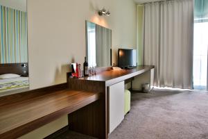 Μια τηλεόραση ή/και κέντρο ψυχαγωγίας στο Golden Beach Park Hotel - All inclusive