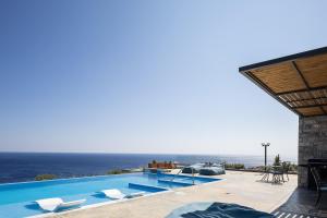 The swimming pool at or close to Seafront elegant villas, with infinity pools & devine views!