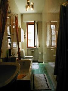 Koupelna v ubytování Luxury Place Appartamento cun giardin