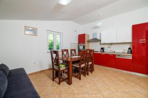 Kuchyň nebo kuchyňský kout v ubytování Apartment Toma