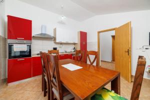 Kuchyň nebo kuchyňský kout v ubytování Apartment Toma