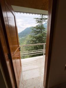 Nespecifikovaný výhled na hory nebo výhled na hory při pohledu z hotelu