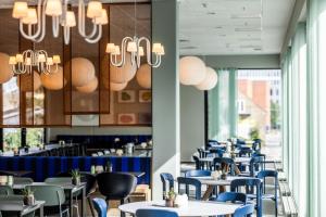 A restaurant or other place to eat at Comwell Aarhus Dolce by Wyndham
