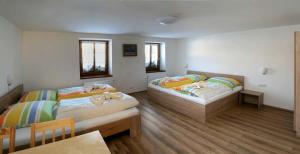 Postel nebo postele na pokoji v ubytování Apartments Stein