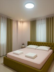 Postel nebo postele na pokoji v ubytování Hotel Erta