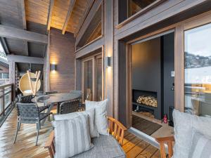 Posedenie v ubytovaní Duplex avec espace détente, piscine et 4 chambres à Megève - FR-1-569-66