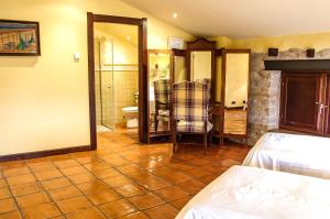 Cama o camas de una habitación en Hotel Rural Nobles de Navarra