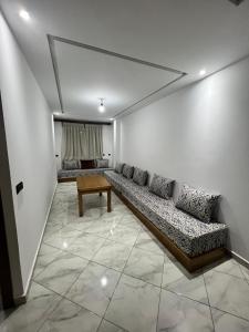 Posezení v ubytování Appartements familiaux confortables à 5 min de la plage Martil شقق عائلية مريحة على بعد 5 دقائق من الشاطئ مرتيل