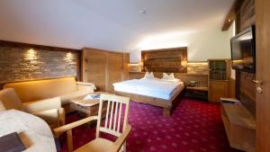 Postel nebo postele na pokoji v ubytování Steinbach-Hotel
