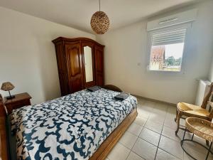 Posteľ alebo postele v izbe v ubytovaní Appartement spacieux avec balcon - à 50m de la plage