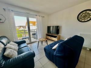 Posedenie v ubytovaní Appartement spacieux avec balcon - à 50m de la plage