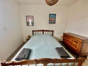 Posteľ alebo postele v izbe v ubytovaní Appartement spacieux avec balcon - à 50m de la plage