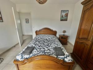 Posteľ alebo postele v izbe v ubytovaní Appartement spacieux avec balcon - à 50m de la plage