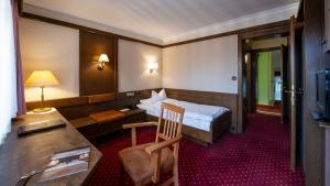 TV a/nebo společenská místnost v ubytování Steinbach-Hotel