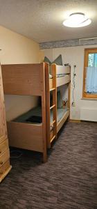 a room with two bunk beds in a room at Ferienhaus Anna in Weitenbach