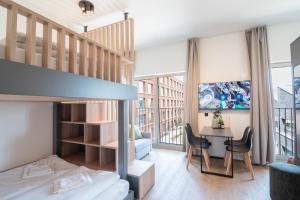 Postel nebo postele na pokoji v ubytování Homaris Apartments Winterhude