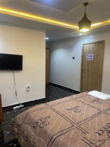 Ένα ή περισσότερα κρεβάτια σε δωμάτιο στο Bellconpet Apartment