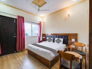 Letto o letti in una camera di The Mountain Lodge Manali !! Scenic Mountain View ! Parking ! Restaurant ! Tasty Food ! Preferred Property