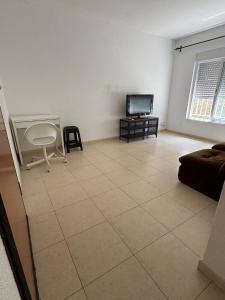 Μια τηλεόραση ή/και κέντρο ψυχαγωγίας στο Guest rooms lisbon +10 φωτογραφίες