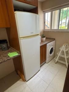 Η κουζίνα ή μικρή κουζίνα στο Guest rooms lisbon