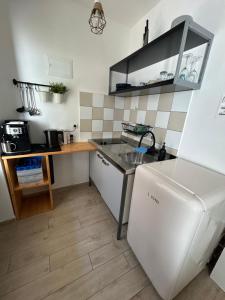 Kuchyň nebo kuchyňský kout v ubytování Villa Marijam