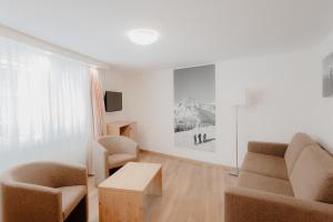 Svetainės erdvė apgyvendinimo įstaigoje Lifestyle & Spa Hotel Grächerhof