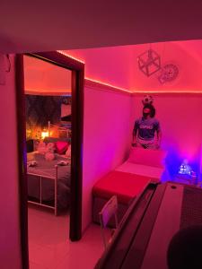 A bed or beds in a room at Donna Margherita Appartamento