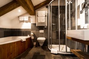 Koupelna v ubytování Lifestyle & Spa Hotel Grächerhof