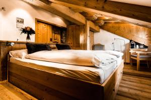Postel nebo postele na pokoji v ubytování Lifestyle & Spa Hotel Grächerhof
