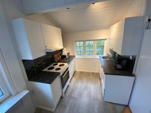 ครัวหรือมุมครัวของ Northern Light Hotell/Camp Steinfjord +66 ภาพ
