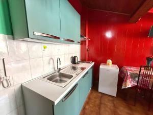 Η κουζίνα ή μικρή κουζίνα στο Suite Garibaldi - Sanremo