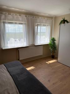 Ένα ή περισσότερα κρεβάτια σε δωμάτιο στο Appartement 1 - Zweizimmerwohnung mit Küche und Bad