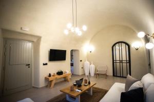 TV o dispositivi per l'intrattenimento presso Iama Luxury Suite Santorini