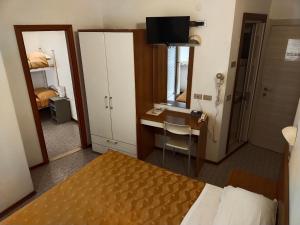 Postel nebo postele na pokoji v ubytování Hotel Goldene Rose