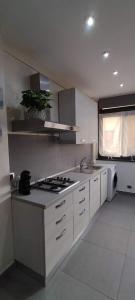 Kuchyň nebo kuchyňský kout v ubytování Vittoria House + 70 fotografií