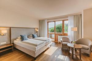 Voodi või voodid majutusasutuse Hotel & Spa Larimar toas