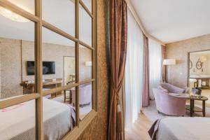 TV a/nebo společenská místnost v ubytování Hotel & Spa Larimar