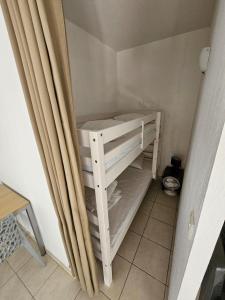 Postel nebo postele na pokoji v ubytování Résidence de tourisme du château de Jouarres + 7 fotografií