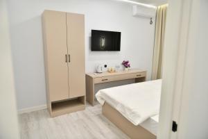 Postel nebo postele na pokoji v ubytování QUT Hotel