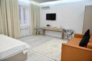 TV a/nebo společenská místnost v ubytování QUT Hotel + 37 fotografií