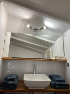 Koupelna v ubytování Centered old town + 9 fotografií