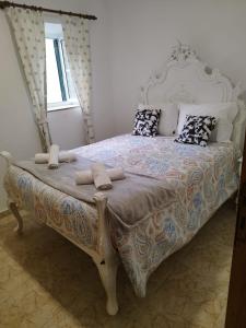 Postel nebo postele na pokoji v ubytování Casa do Corgo