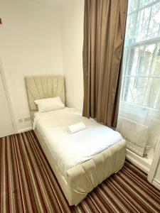Postel nebo postele na pokoji v ubytování The Chapter Hotels - Princes Square