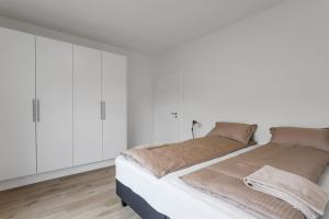 Voodi või voodid majutusasutuse 3BR Modern & Spacious Golden Circle Home toas