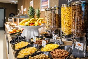 a buffet filled with different types of fruits and snacks at Akademis Academia in Dubrovnik