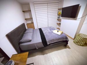 Μια τηλεόραση ή/και κέντρο ψυχαγωγίας στο Comfortable and distinguished Apartment at the Bogota's northern