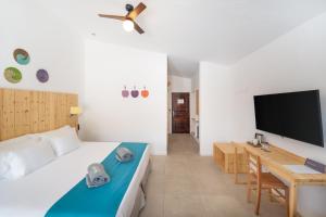 TV a/nebo společenská místnost v ubytování Barceló Marine Boa Vista - Adults Only