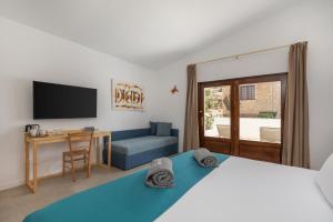 TV a/nebo společenská místnost v ubytování Barceló Marine Boa Vista - Adults Only